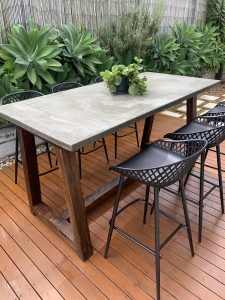 Concrete Bar Table with Ironbark hardwood legs in Walnut color