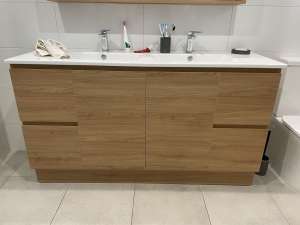 Double sink ceramic vanity with Mountain Ash finish - like new.