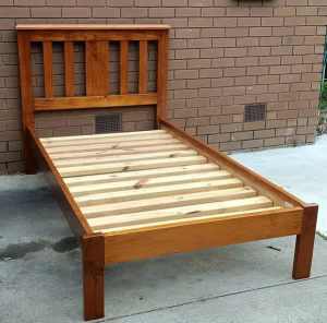 solid timber king single bed with mattress, low end