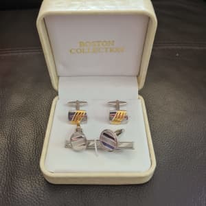 A Set of Cufflinks and a Tie Clip