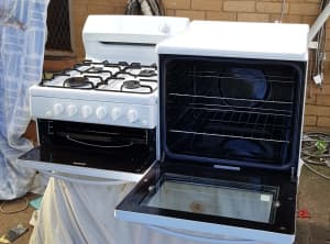Westinghouse 1235, elevated, natural gas, oven, grill and cook top.