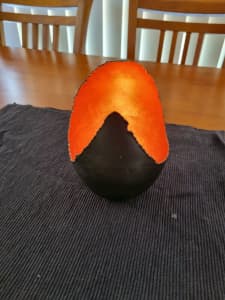 Egg shaped tealight candle holder