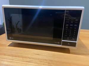 Microwave LG iWave - works but door open button is loose/falls out