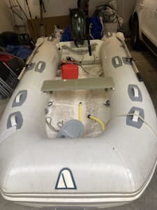 Inflatable boat with outboard