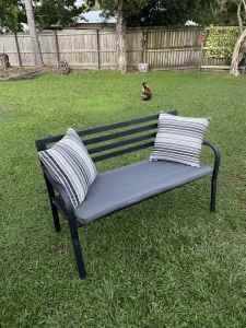 Outdoor bench seat , including cushions