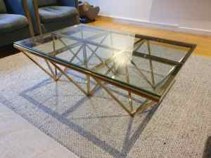 glass coffee table with gold base
