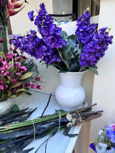A bunch of lush Artificial silk purple Delphinium flowers
