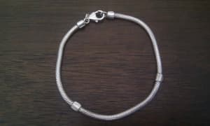 Brand New silver bracelet, can add beads or charms, present gift idea!