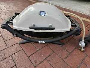 WEBER Q with fold down trays and a foldable trolley