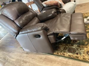 Two brown leather recliners