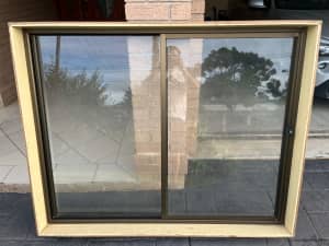 Aluminum window frame with glass
