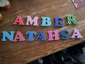 Natasha and Amber solid plastic letters