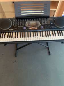 As new - Casio CTK 531 100 song bank keyboard with stand & AC Adaptor