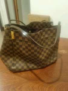 Louis vuitton genuine leather tote bag tagged on inside