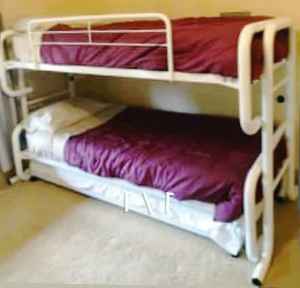 metal single bunk beds and mattresses, timber slats
