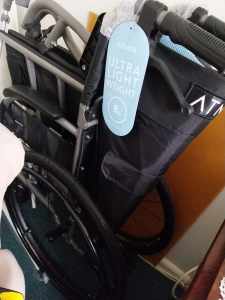 New wheelchair never used still has plastic on it. Unwanted gift