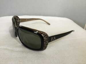 Sunglasses by Elizabeth Arden Eyewear Collection.