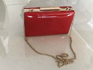 NEW with Tag Red Colette Clutch / Handbag $15. 20cmx 12cm x 5cm.