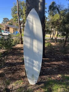 Bryan Bates mid length surfboard