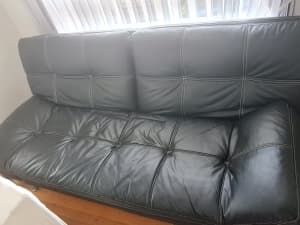 Black sofa bed couch.