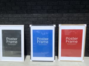 Brand new white, black and oak timber poster frames 60cm x 90cm