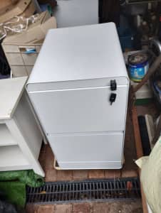 Two white 2 drawer metal filing cabinets with keys $150