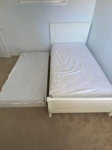 Pull out trundle bed (includes mattresses)
