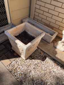 Concrete square planter measures 17 X17 inches wide and 17 inches H.