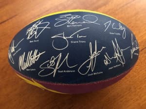Broncos football with signatures