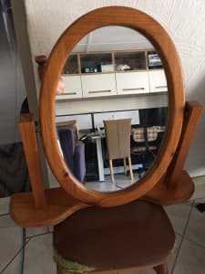 Dressing table mirror. Oval and made of pine.