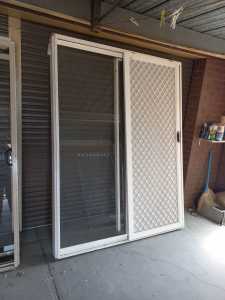 Custom made prime rose aluminium sliding door with crime safe mesh 