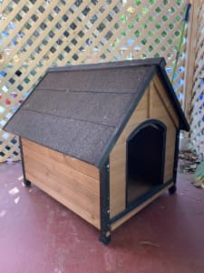 Wooden dog house.