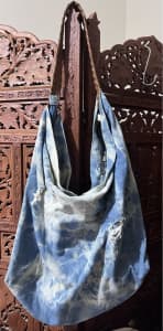 Boho tie dye denim bag distressed look. Plated leather look strap