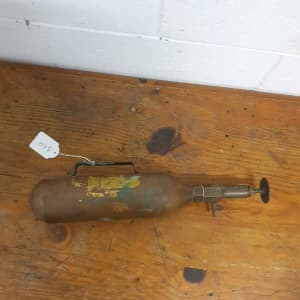 Antique copper fire extinguisher from an early military aircraft rare