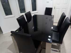 Dinning table with chairs and buffet