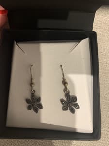 Brand new earrings in box