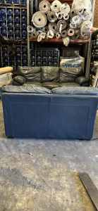 Leather couches in fair condition