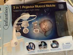 (On hold)Almost brand new 3 in 1 projector musical mobile
