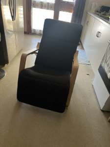 Rocking chair with foot adjuster