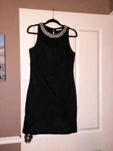 Little black dress with crystal neck line. Size 10.