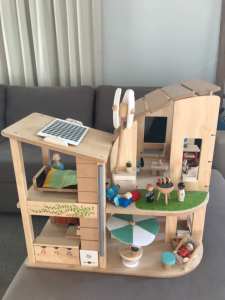 Plan Toy wooden dollhouse- eco design
