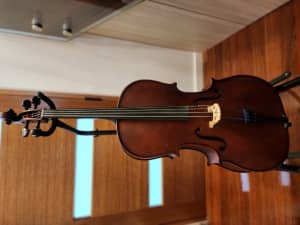 For sale is a 1/4 sized Cello and its bow -Strings recently changed