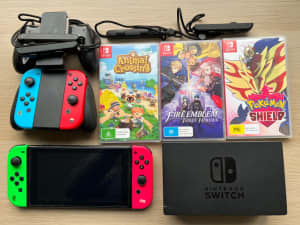 Nintendo Switch with additional Joy-Cons and 3 great games