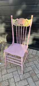 Very old pink dining chair