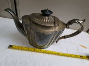 Antique tea/coffee pot it have maker mark and engraved 