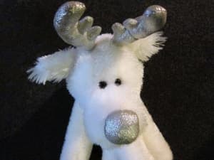 Cuddly plush Christmas toy. White & silver reindeer. Bright & clean