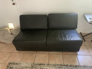 Free 2 seater leather lounge. Great condition