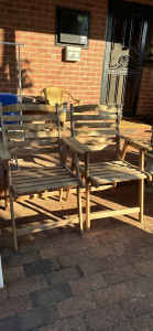 2 timber outdoor dining chairs