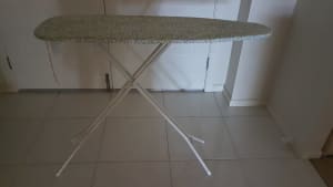 Adjustable ironing board