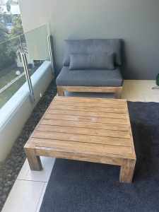 Outdoor single lounge with coffee table